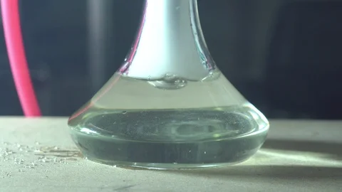 Glass hookah on table on smoke Stock Footage 102524546