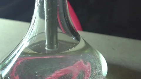 Glass hookah on table on smoke in slow motion Stock Footage 102532714