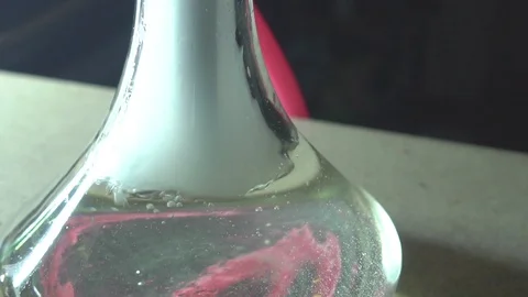 Glass hookah on table on smoke in slow motion Stock Footage 102532747