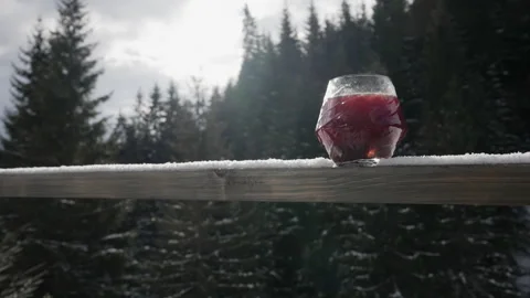 Glass of hot drink on the railing Stock Footage 265098527