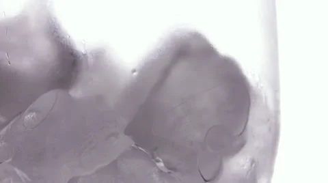 Glass with ice cubes Stock Footage 34311253