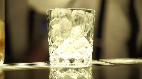 A glass with ice cubes Stock Footage 71494255