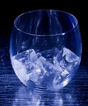 Glass with ice cubes Stock Photos