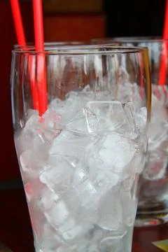 Glass with ice cubes Stock Photos