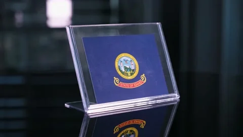Glass Idaho Flag Rotating On Table 動画素材 208495702