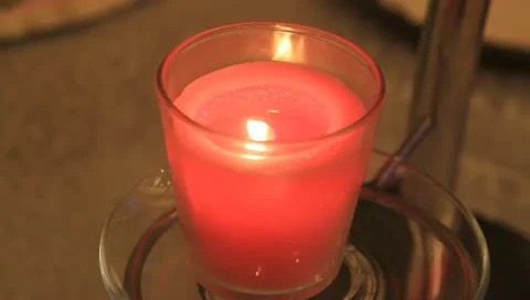 Glass inside a burning candle Stock Footage 10793424