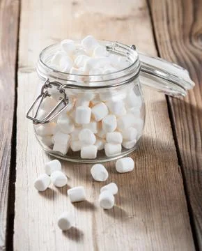 Glass jar with marshmallows Stock Photos