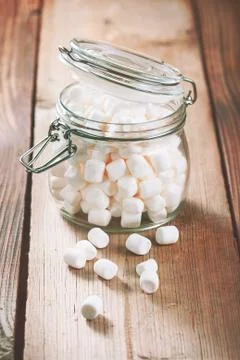 Glass jar with marshmallows Stock Photos