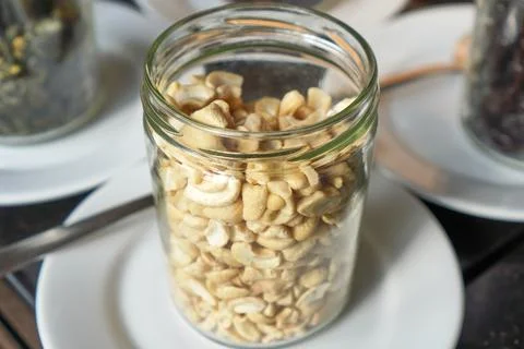 Glass Jar of nuts on Buffet Table Foto stock