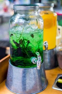 Glass jars with cold lemonade Stock Photos