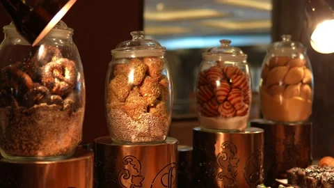 Glass Jars Filled with Mixed Dry Fruits and Healthy Snacks on Buffet Counter Stock Footage 341655025