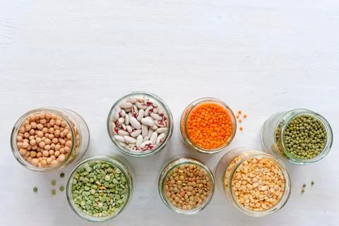 Glass jars full of assorted dried legumes Stock Photos