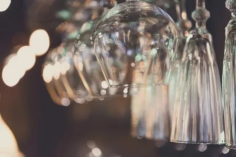 Glass jars hanging with strings on a rustic background 스톡 사진
