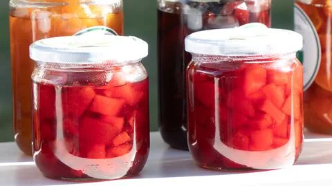 Glass jars with jam close-up Stock Photos