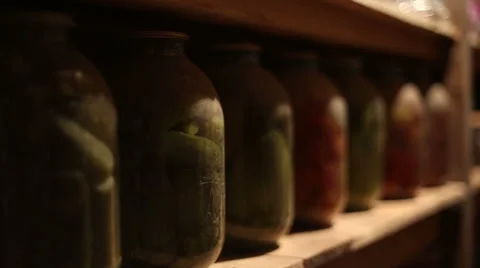 Glass jars with salted vegetables Stock Footage 58772495