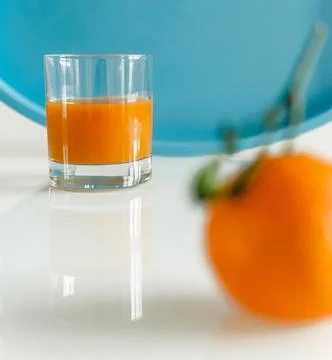 Glass of juice Stock Photos