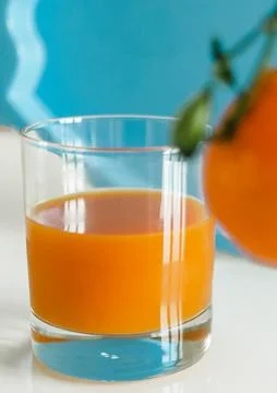 Glass of juice Stock Photos