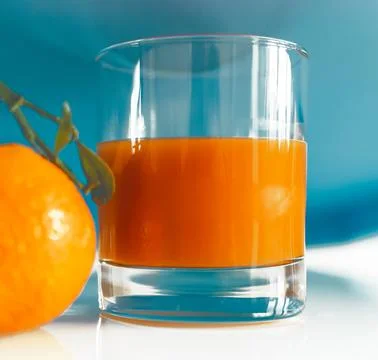 Glass of juice Stock Photos
