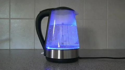 Glass kettle with blue light. Stock-Footage 131366299