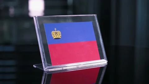 Glass Liechtenstein Flag Rotating On Table 動画素材 208503580