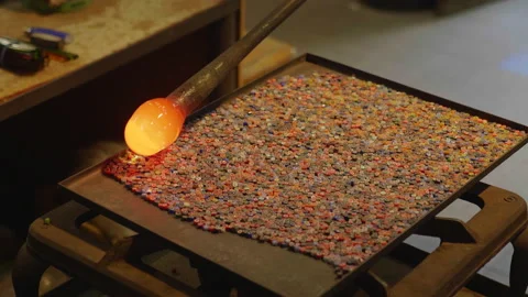 Glass-maker in Murano works Stock Footage