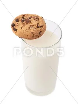 Glass of milk and cookie isolated over the white background Stock Photos