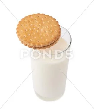 Glass of milk and cookie isolated over the white background Stock Photos