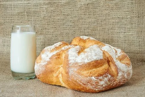A glass of milk with bread Stock Photos