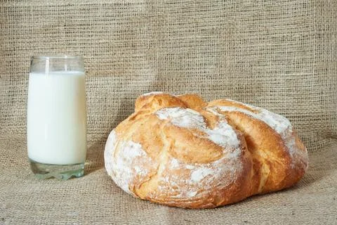 A glass of milk with bread Stock Photos
