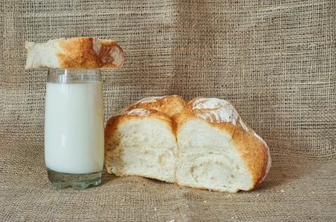 A glass of milk with bread Stock Photos