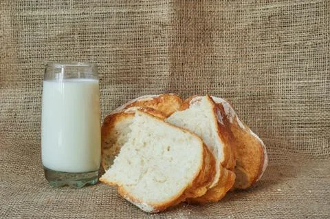 A glass of milk with bread Stock Photos