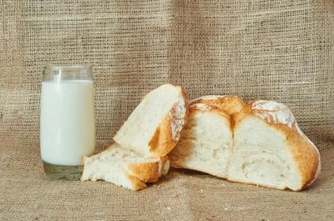 A glass of milk with bread Stock Photos