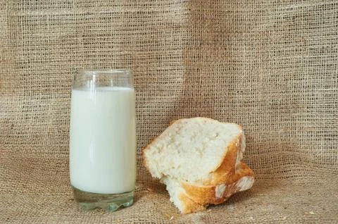 A glass of milk with bread Stock Photos