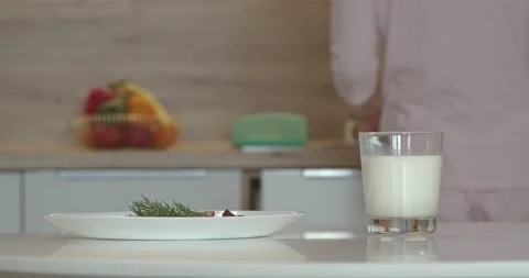 A glass of milk is on the table Video stock 155320256