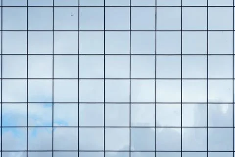 Glass with mirror effect in frames, facing of modern office building. Reflect Stock Photos