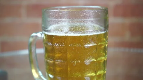 A glass mug on a table Video stock 134960264