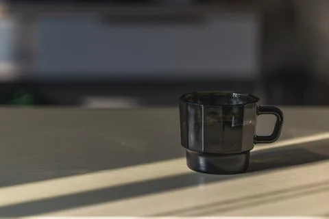 Glass Mug in Window Light with Copy Space Stock Photos