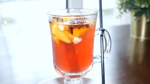 Glass of mulled wine stands on the table. Stock Footage 122389889