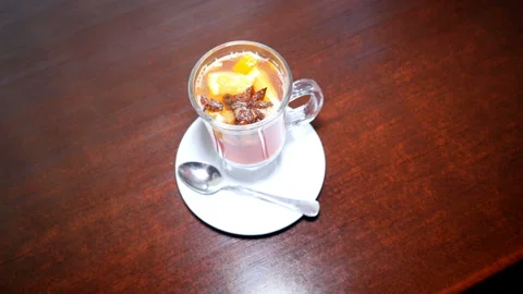 Glass of mulled wine stands on the table. Top view. Stock Footage 122390008