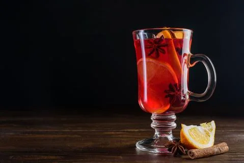 Glass of mulled wine on table Stock Photos