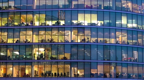 Glass office exterior, view of office workers at work, London, UK Stock Footage