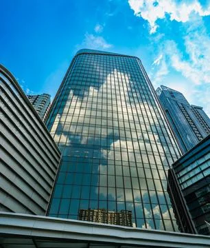 Glass office tower reflection Stock Photos