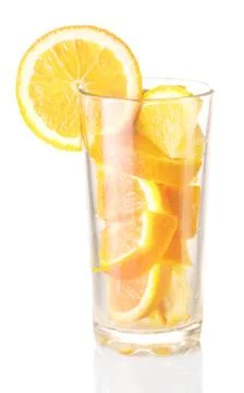 Glass with orange Stock Photos