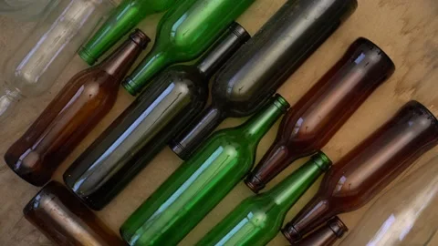 Glass packaging recycle. Empty used bottles and jars. Household waste. Glass Stock Footage 155430608