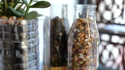 Glass of pebbles close up wedding Stock Footage 113337559
