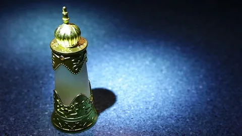 Glass perfume bottle marble background Stock Footage 127840607