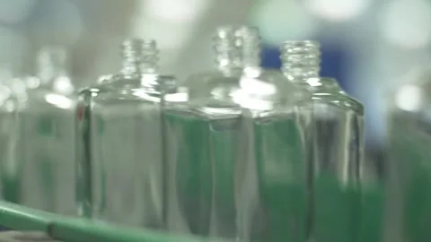 Glass perfume flasks at treadmill Stock Footage 271353638