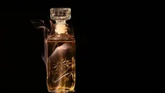 glass perfume smoke dark background nobo... | Stock Video | Pond5