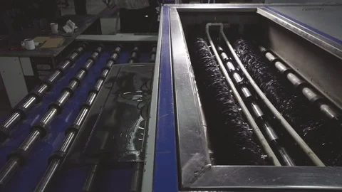 The glass is placed in the grinding machine Stock Footage 105370143