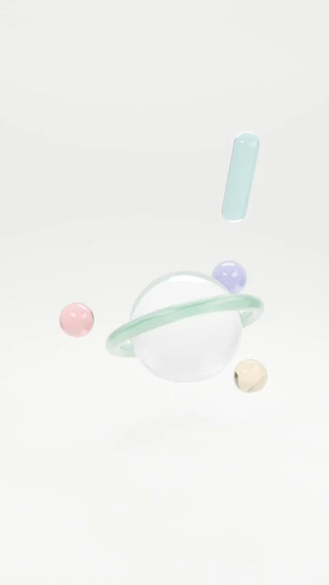 Glass planet with a mint ring and orbiting pastel marbles, abstract Stock Footage 346632794